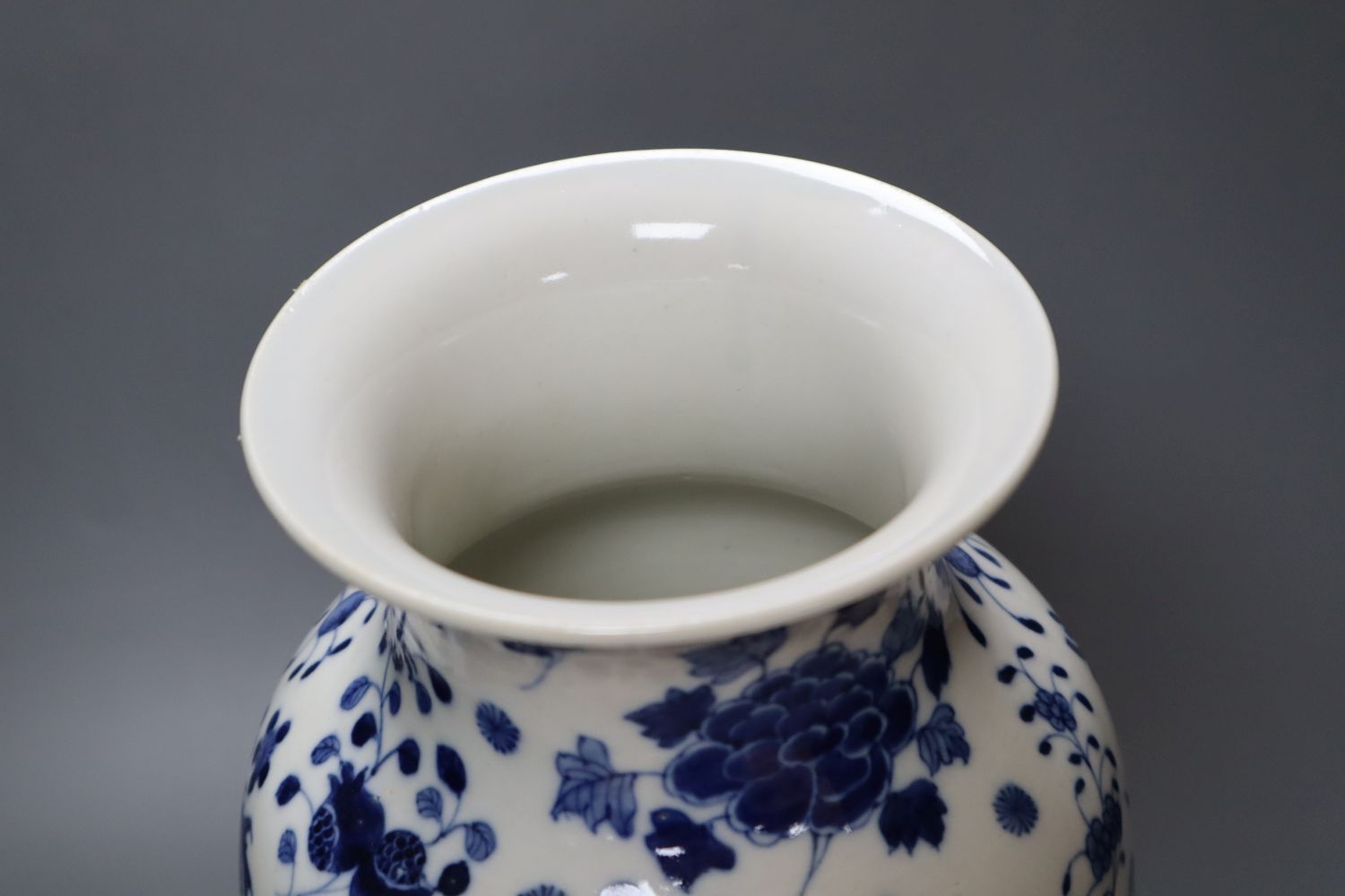 A Chinese porcelain baluster vase, painted with dragons and foliage, height 37cm